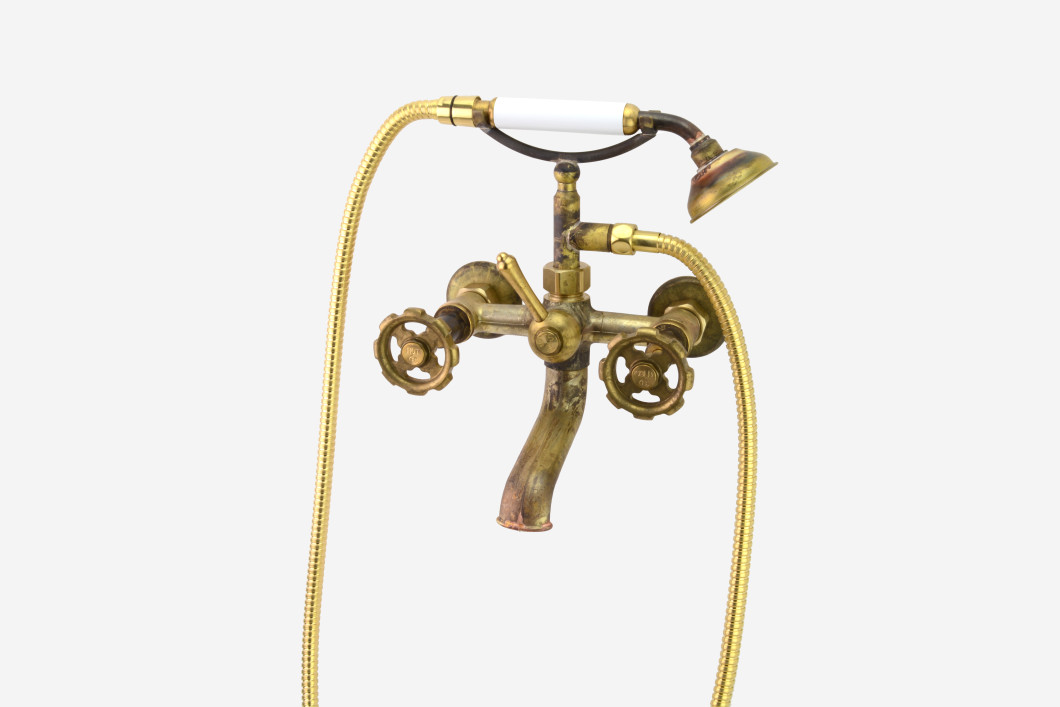 Photo: SP9481 in Raw Brass (RB) finish with White Handshower Handle