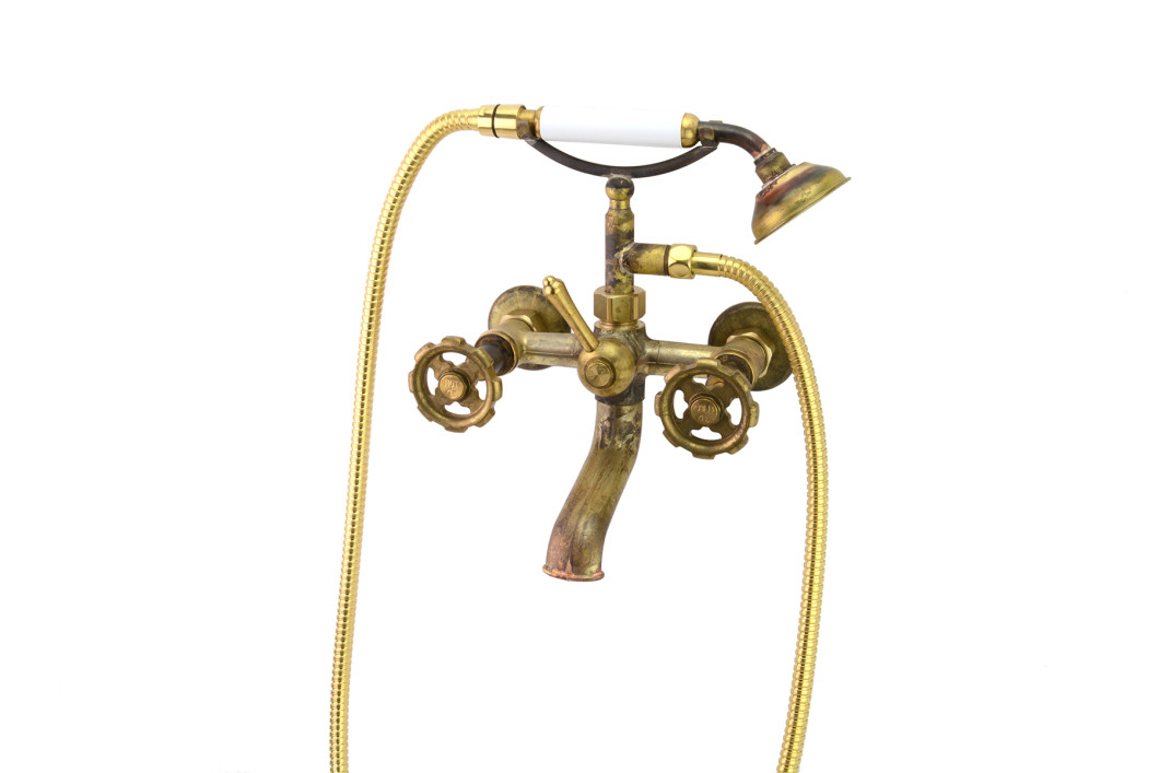 Photo: SP9481 in Raw Brass (RB) finish with White Handshower Handle