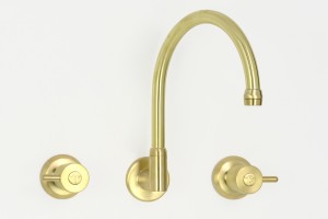 Photo: TL3614 in Lea Wheeled Brass (LW) finish with Engraved Button Upgrade (EBU), shown immediately after manufacture