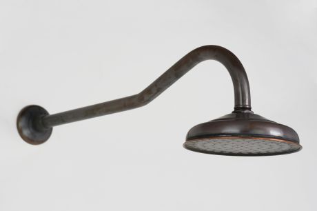 Roulette Gooseneck Shower Arm & Rose in Florentine Bronze immediately after manufacture